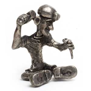 Figurine de mineur avec burin en tain